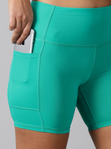 Sea green training shorts with side pockets